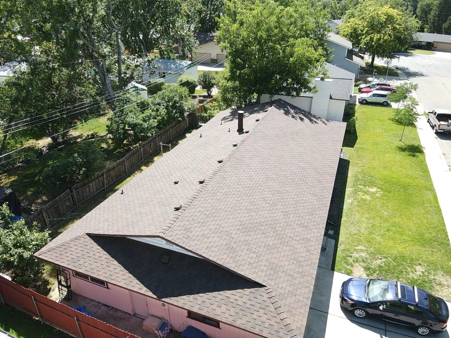 A new roof plane on a brick ranch