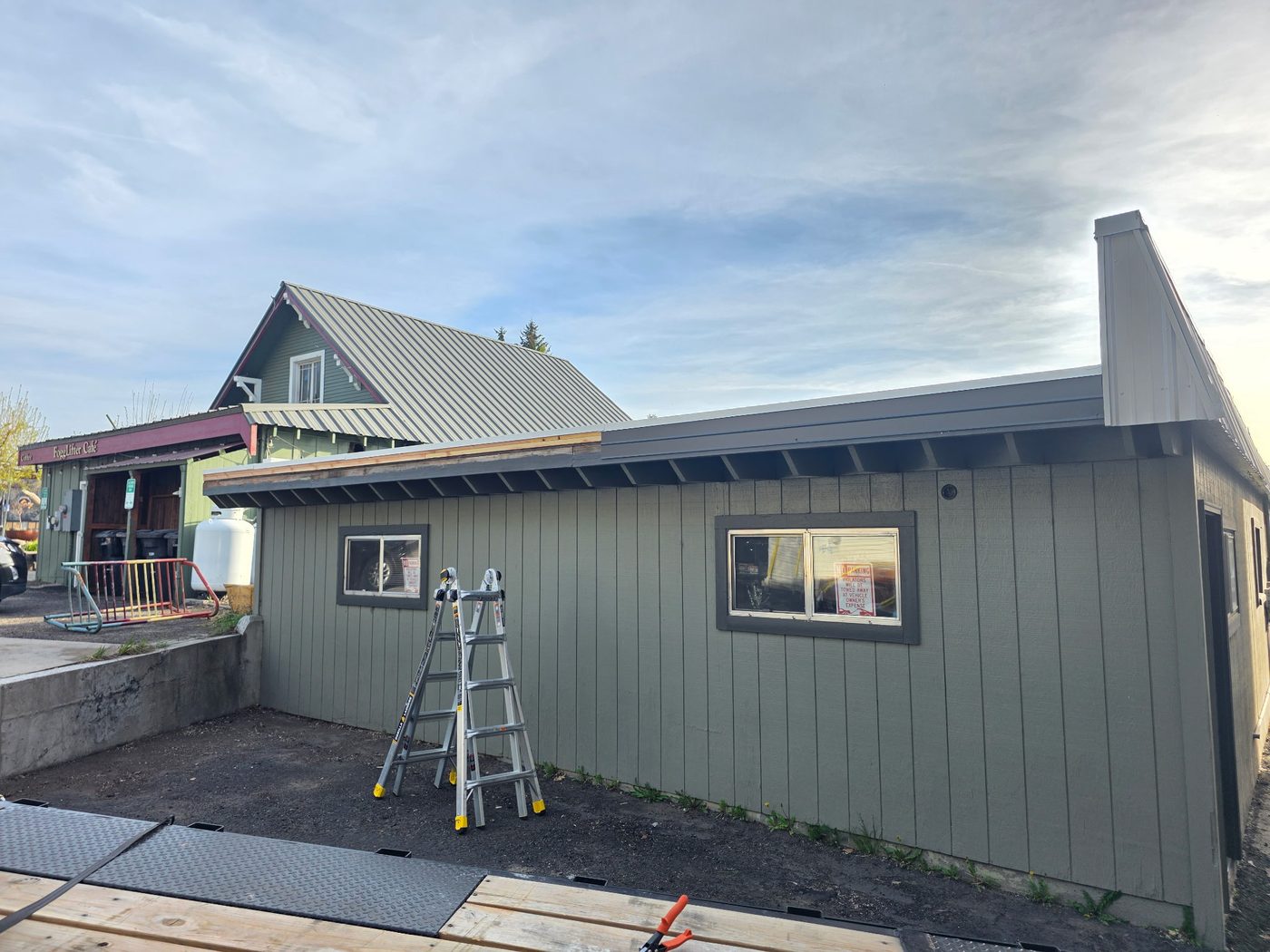 Fascia rebuild in progress on the commercial flat roof