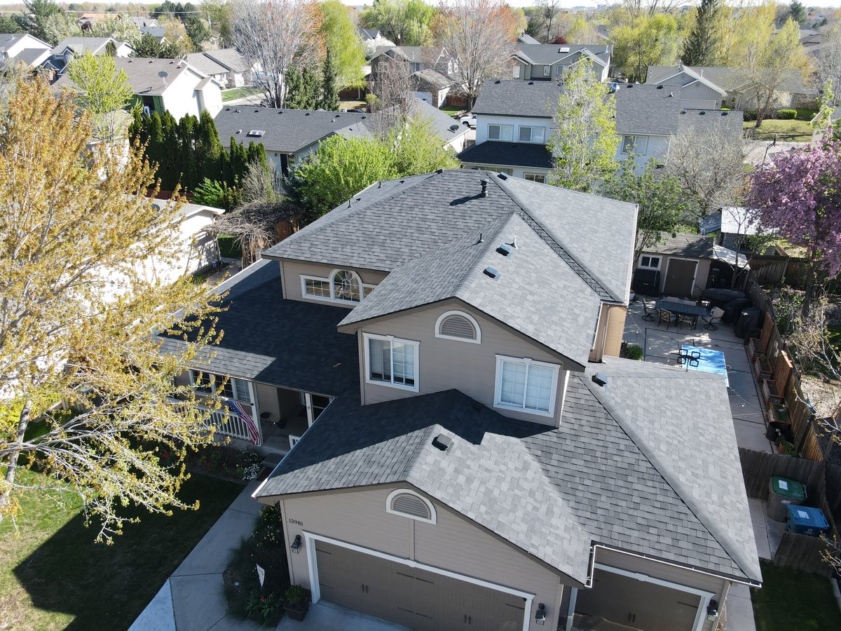 Completed residential roof on a two-story Treasure Valley home