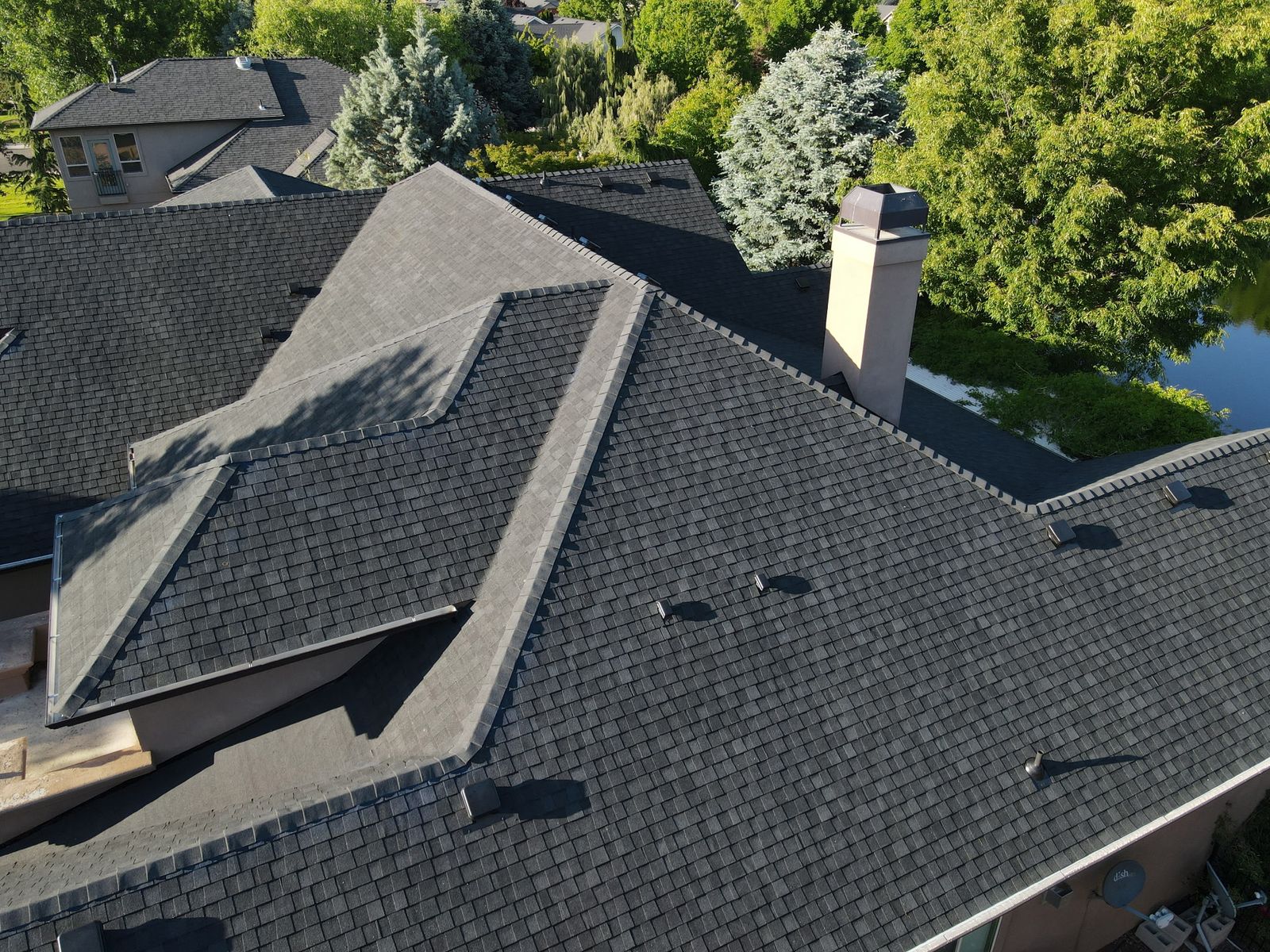 Dark gray shingle on a large home