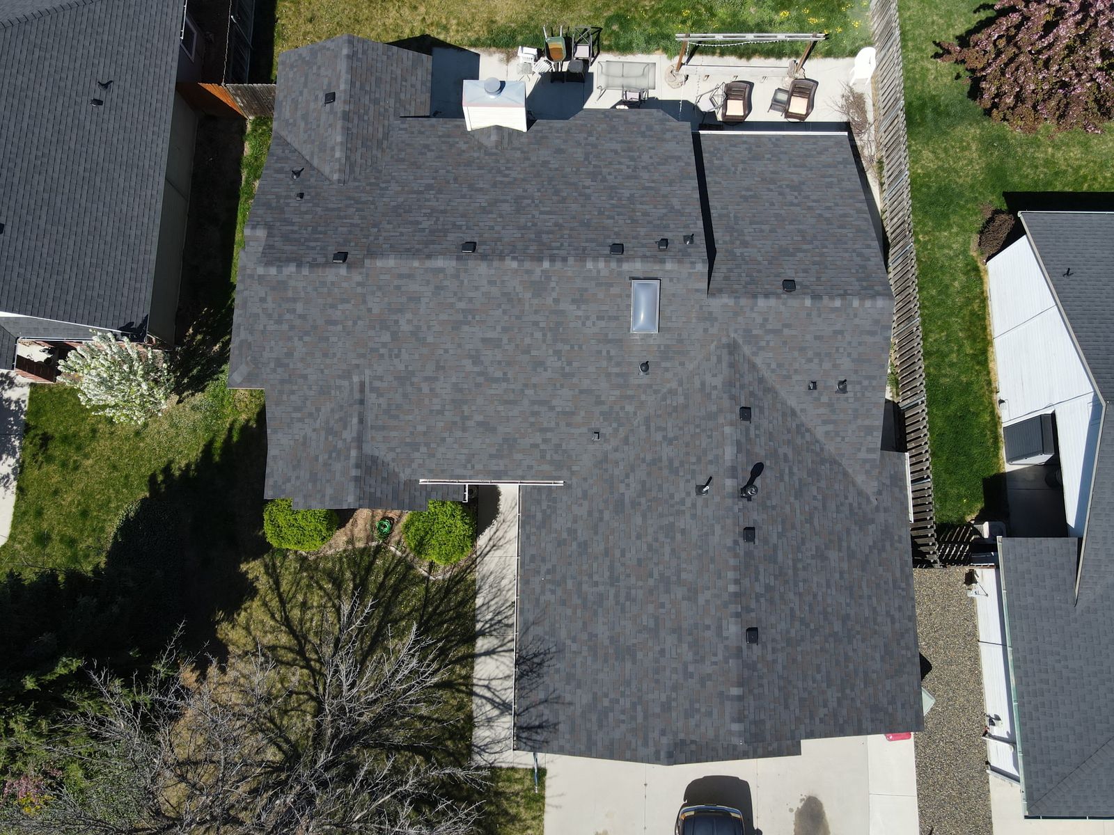 A suburban reroof over the back patio