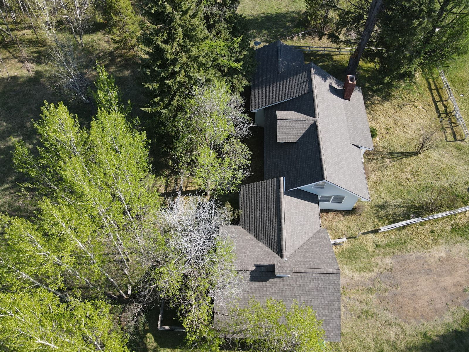 Rural reroof among aspens