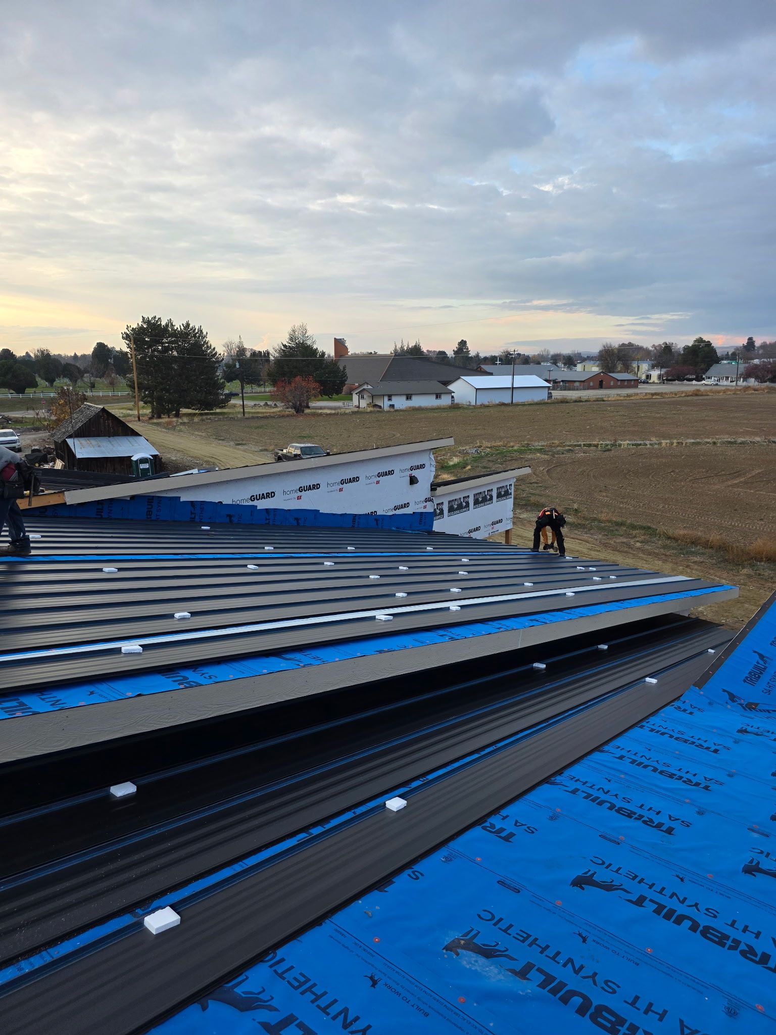 Panel and trim detail at the eave