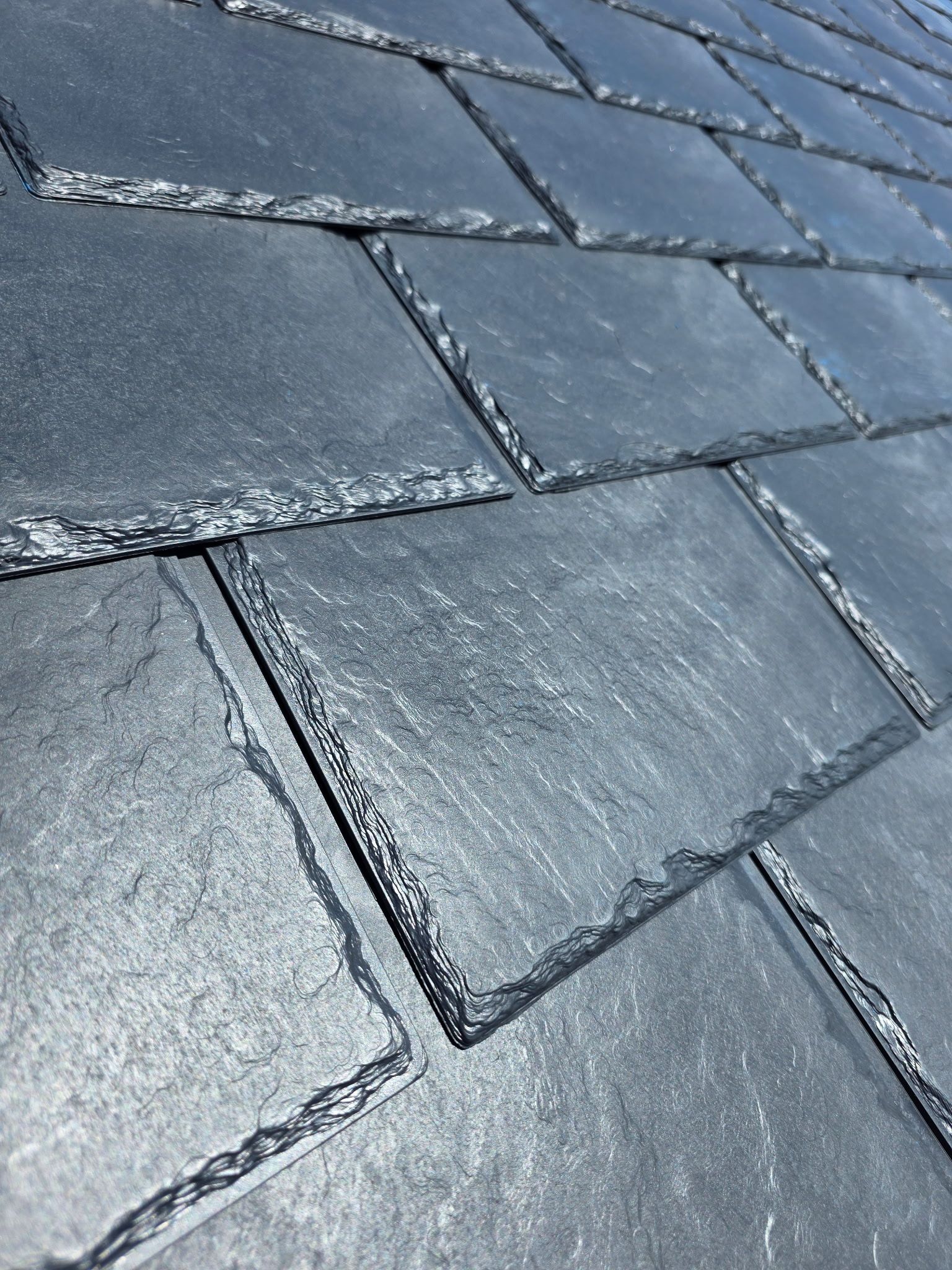 Synthetic slate tiles, laid and spaced